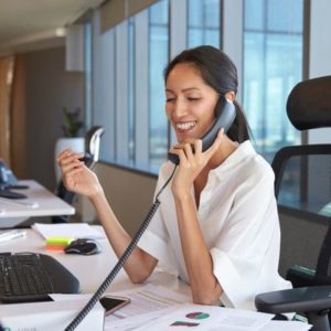 Happy woman on the phone with Direct Barcode Printer Repair